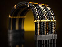 Black and yellow sleeved PC cable extensions with cable combs