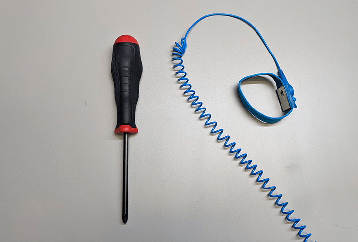 Anti-static Wrist band and screwdriver.